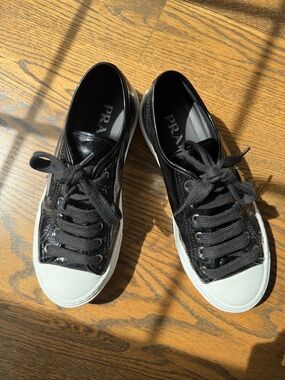 Prada Black Patent Leather Sneakers with White Toe Caps